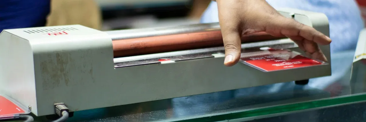 A roll laminator in use