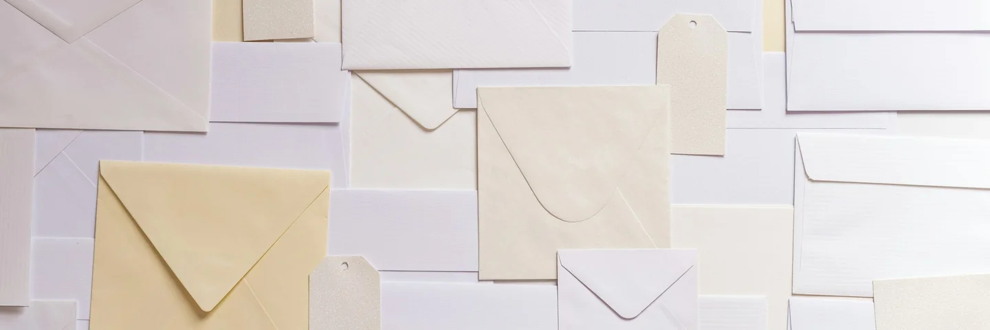 Envelopes and paper on a desk